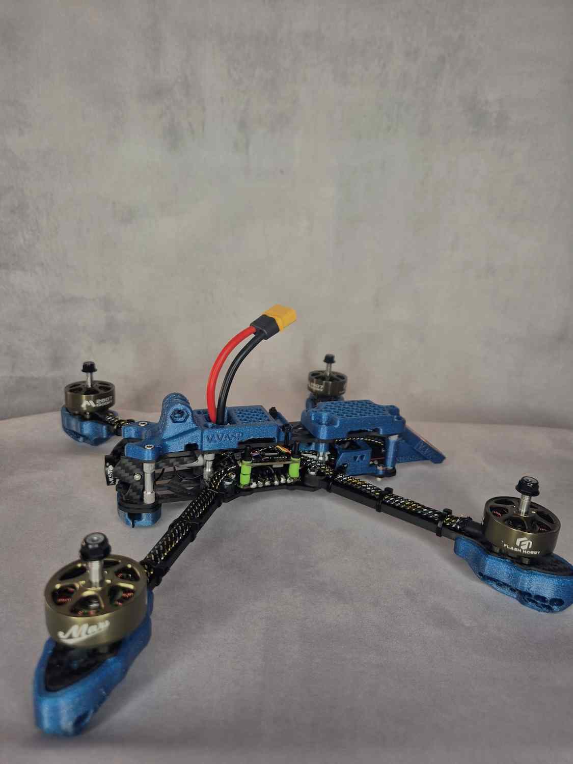 diy fpv race drone on a gray background strigoi-7 side